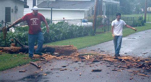 2me and steve moving a fallen tree on the road